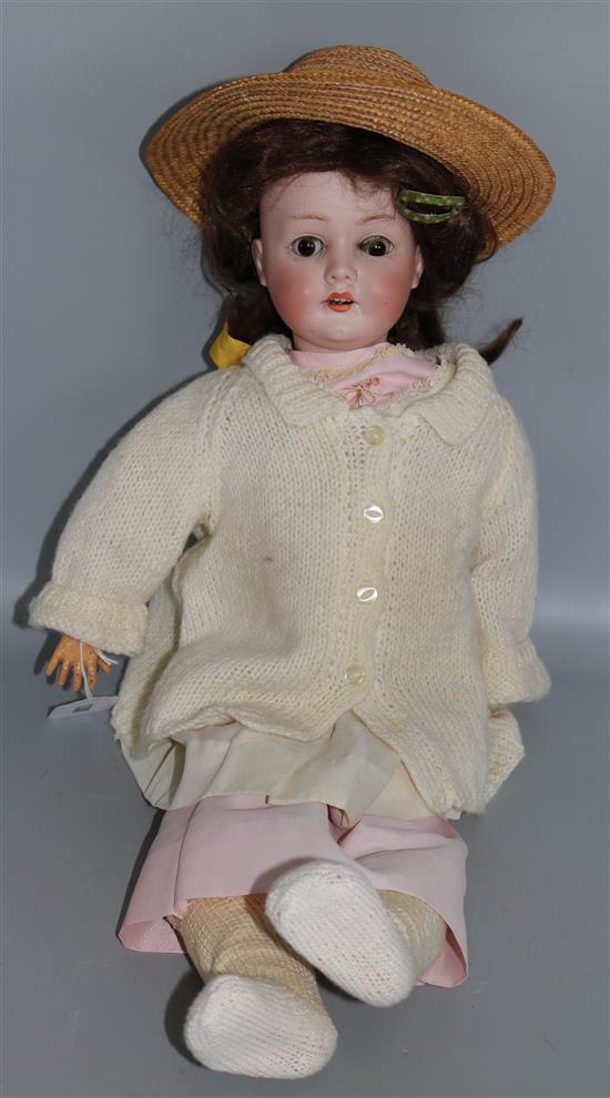 An AEM Bergmann open mouthed china headed doll L.62cm